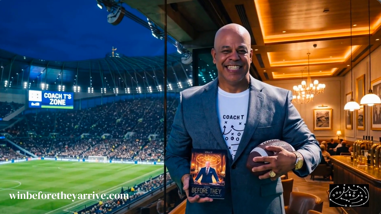 Coach T at the stadium holding his book Win Before They Arrive